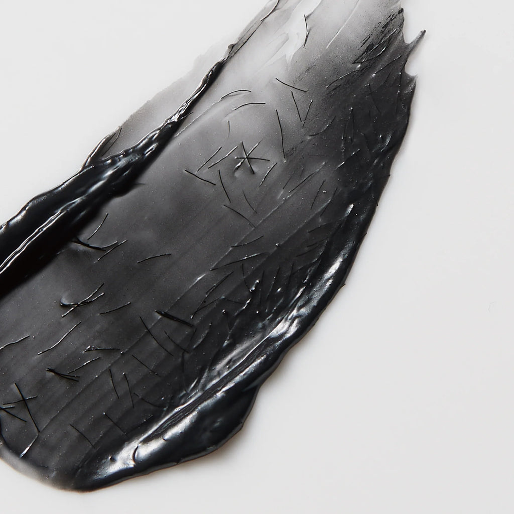 Black shoe insole with a brand logo on a white background