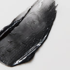 Black shoe insole with a brand logo on a white background