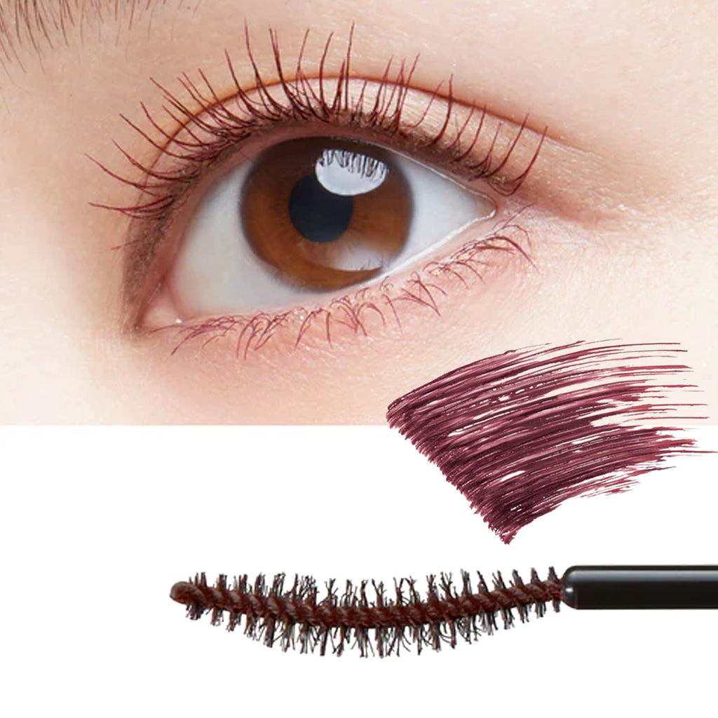 Close-up of an eye with brown eyeliner and a mascara brush with purple color on a white background