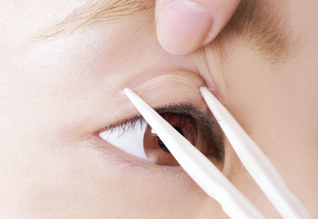 Put the tape on your eyelid