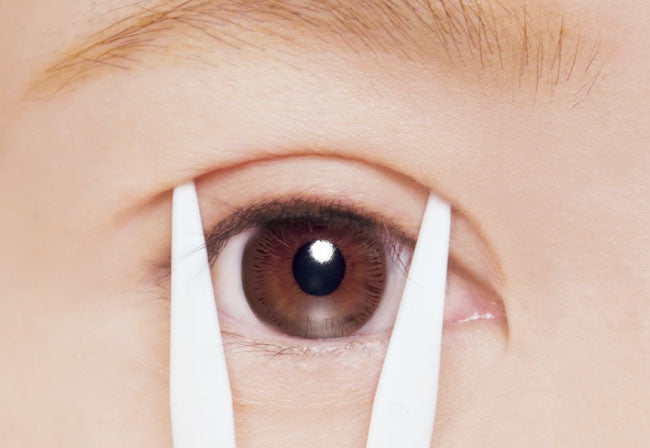 Push V-stick into your eyelid